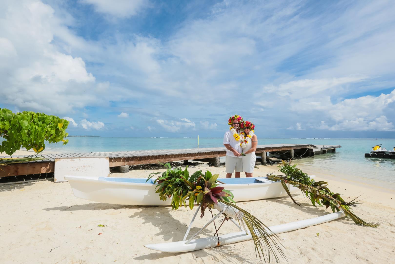 Outrigger canoe with our wedding couple