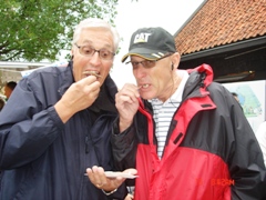 The brothers are eating eels like the locals