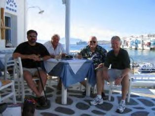 Guys enjoy a break in Mykonos, Greece